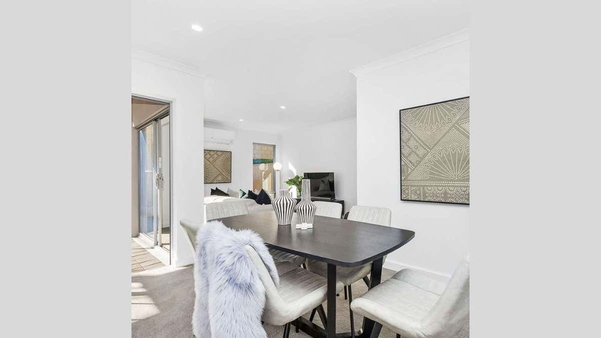 dining room next to kitchen in modern home